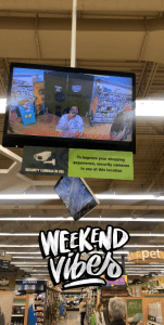 The author takes a photo of themselves in a CCTV screen in a store; a filter says "Weekend Vibes."