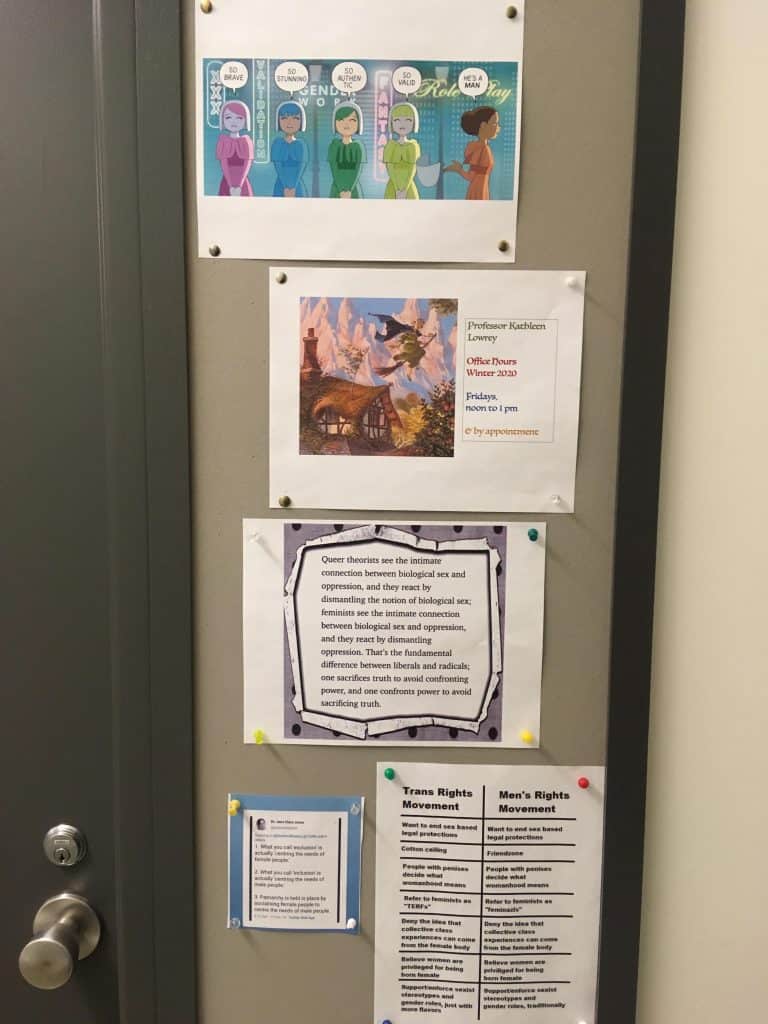 Photo of office door, with different set of cutouts from previous